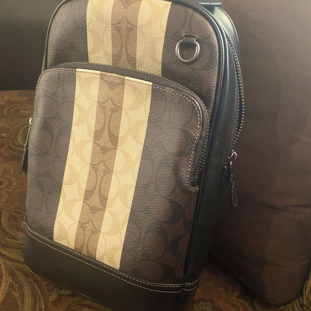 Coach sling backpack bag